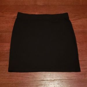 Plain black mini skirt